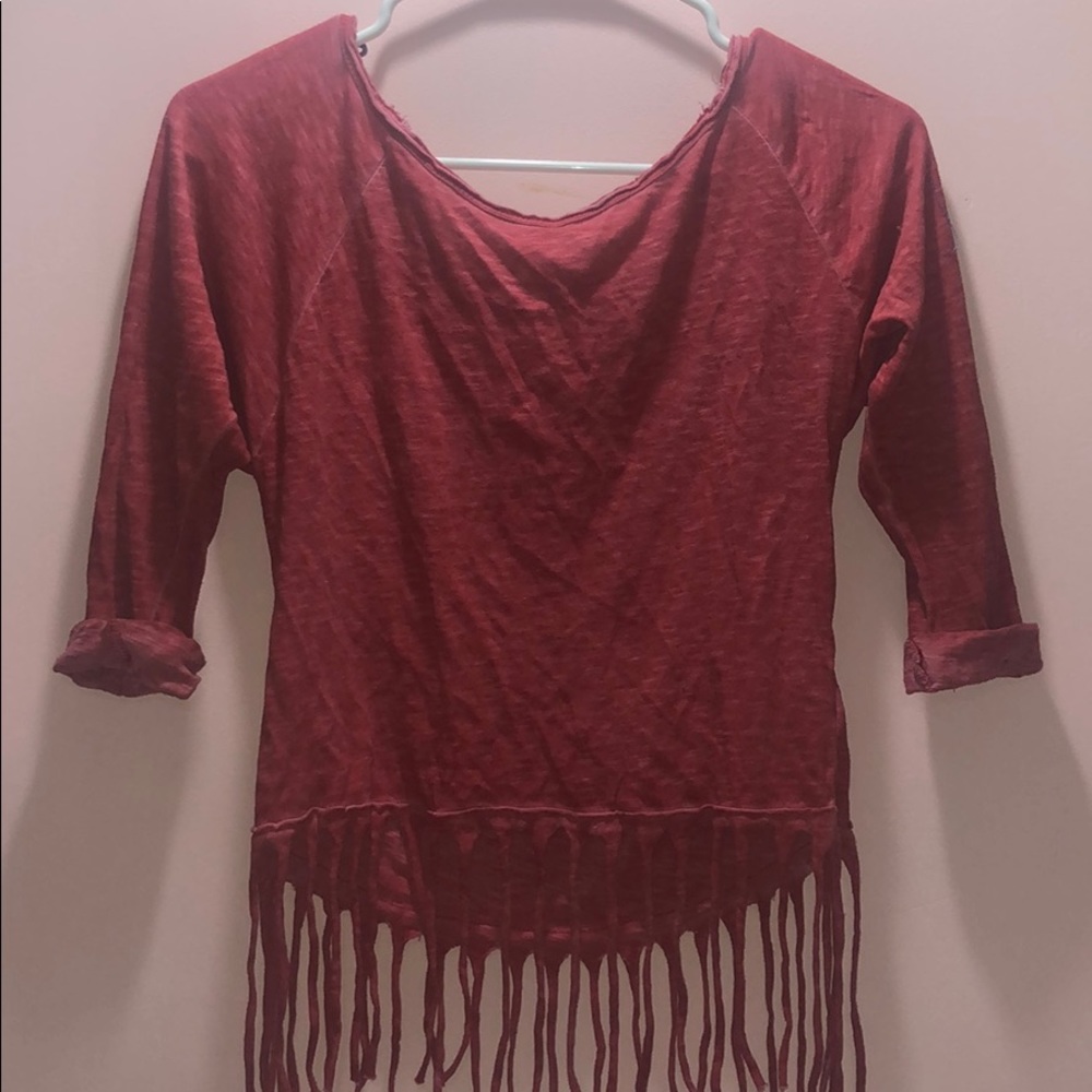 Women’s red three quarter fringe blouse